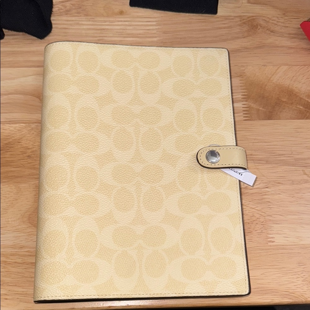 Coach Cream and Yellow Signature Notebook